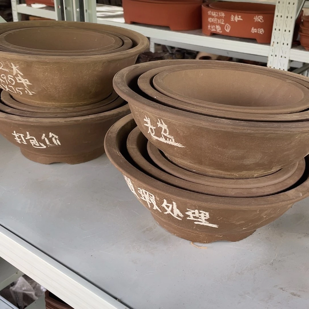 微瑕处理紫砂四组圆盆