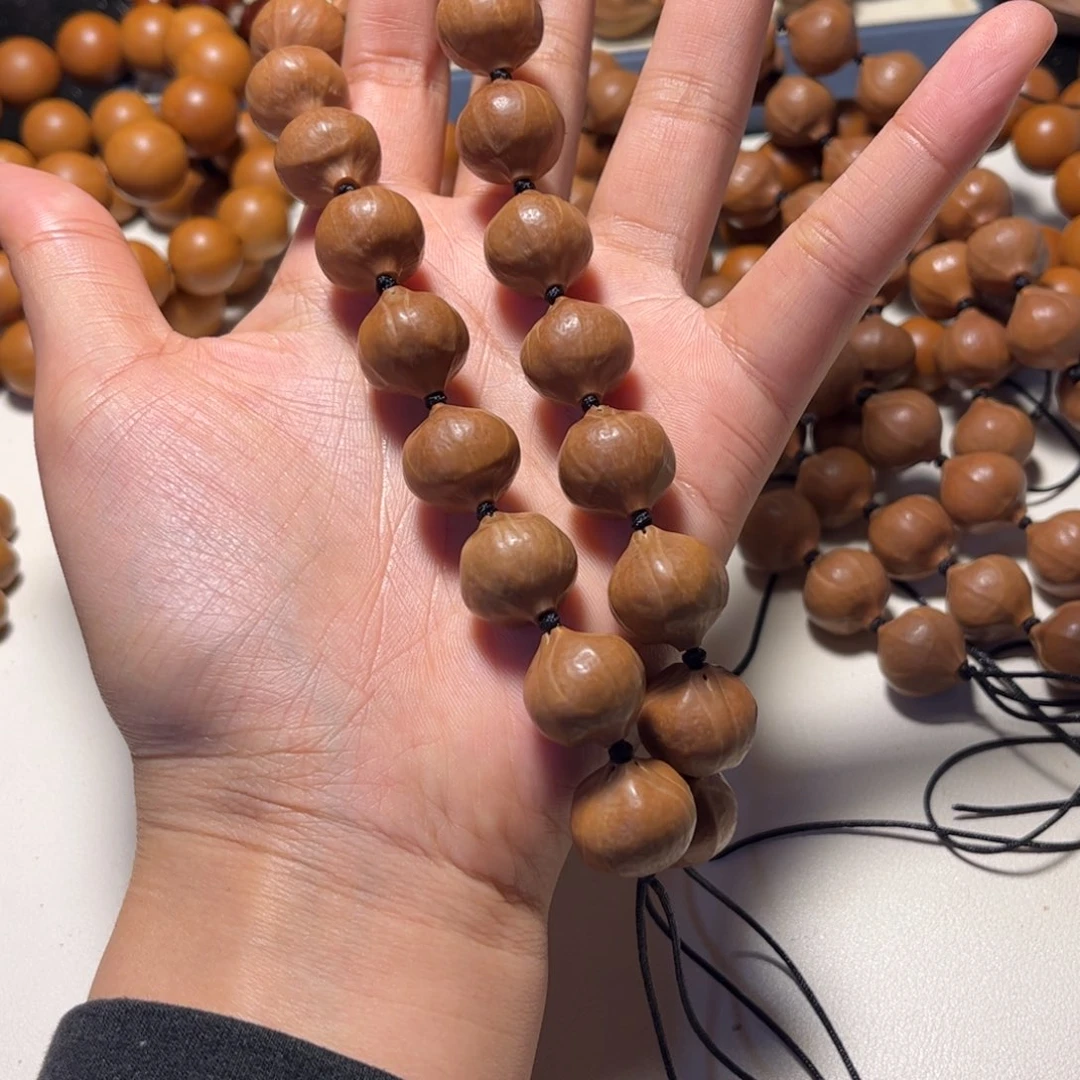 橄榄核手串/手链孙***面1.65左右原核手持