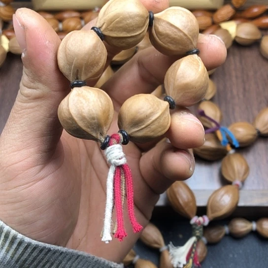 李***虎吊坠橄榄核图我哦哦哦