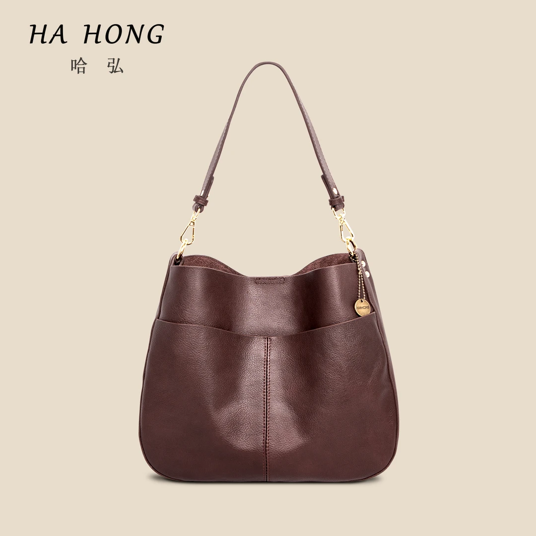 新款软皮高级感百搭小众设计单肩水桶包气质圆托特通勤斜挎手提