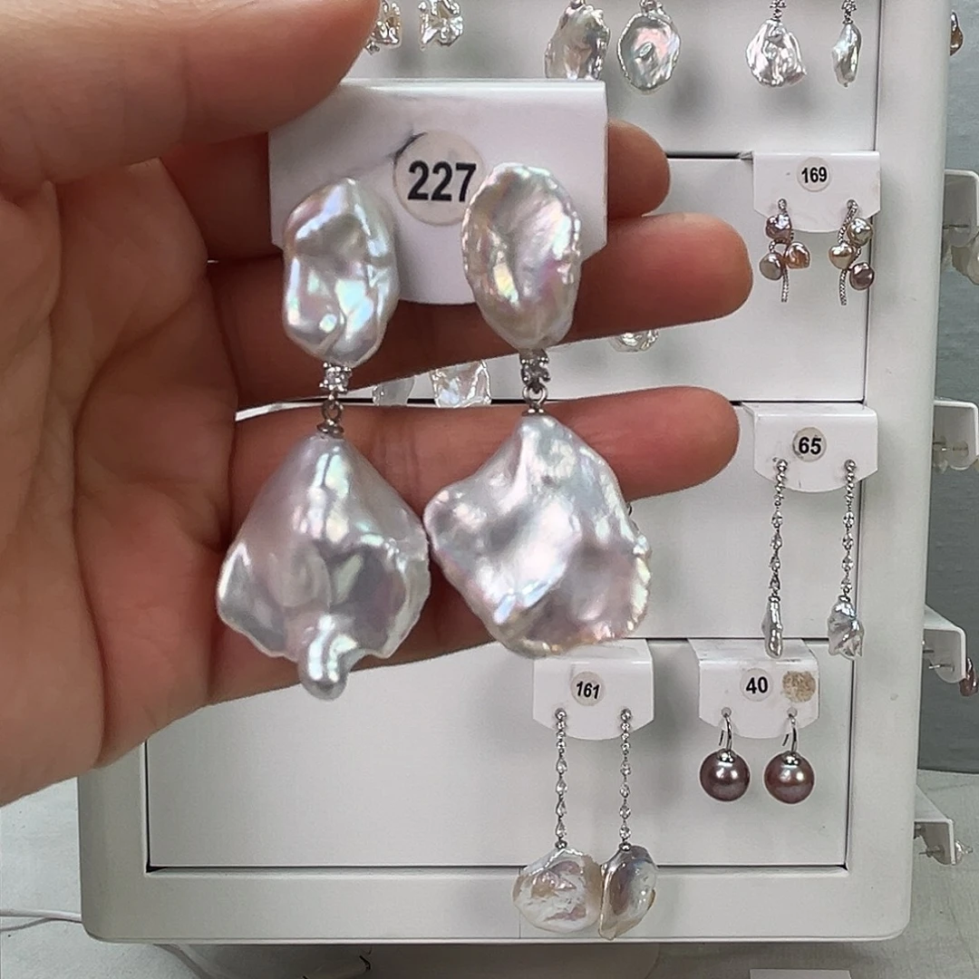 劉***墨非金属925银淡水227