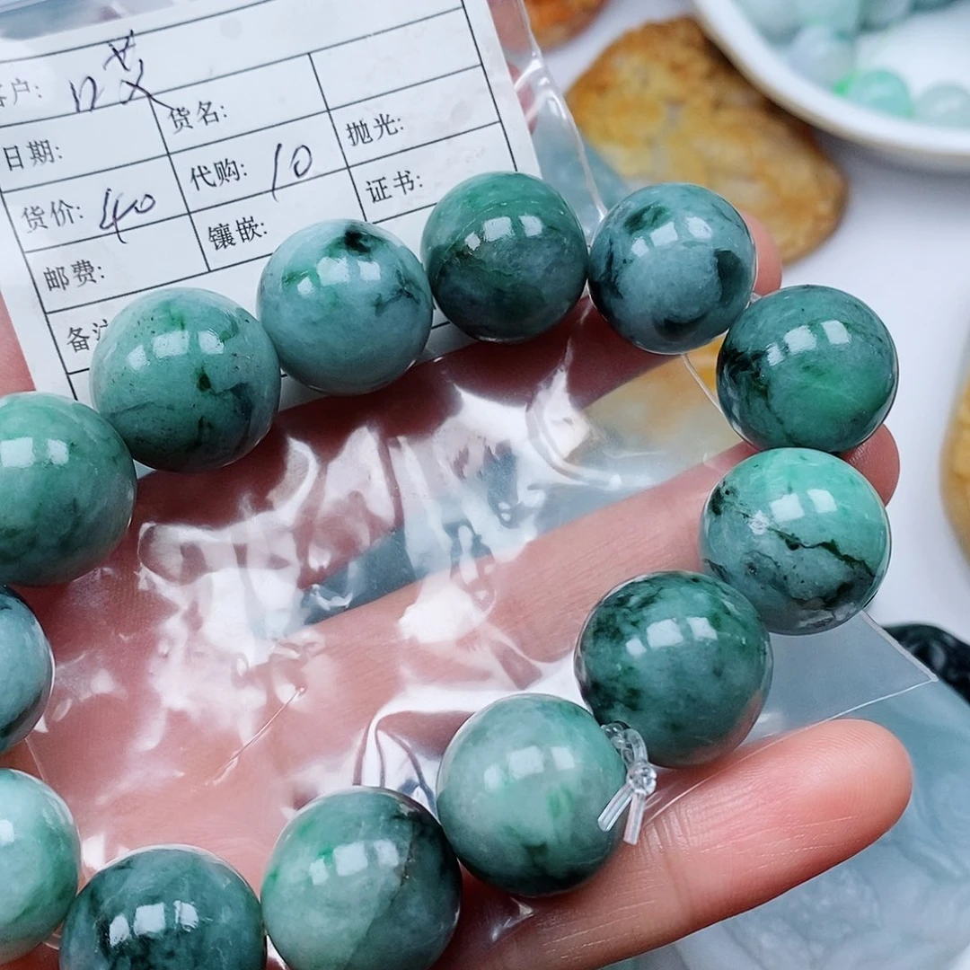 哎***。翡翠未镶嵌颈饰翡翠