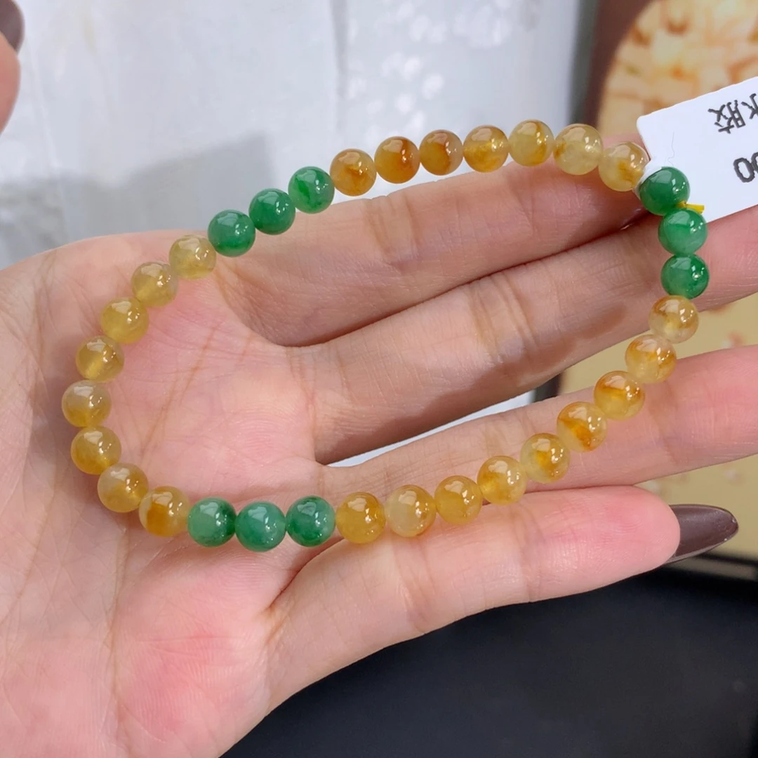 翡翠未镶嵌手串卡5.6细润黄绿手串