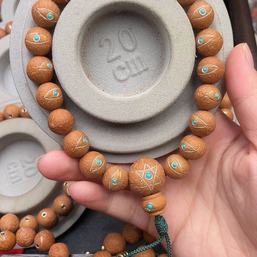 凤眼菩提吊坠紫金