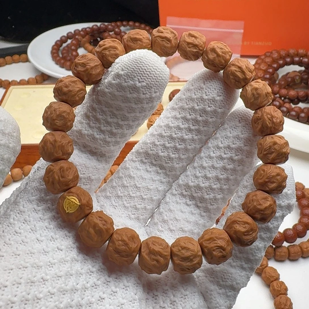 猴头核桃吊坠快**?龙腾带金标