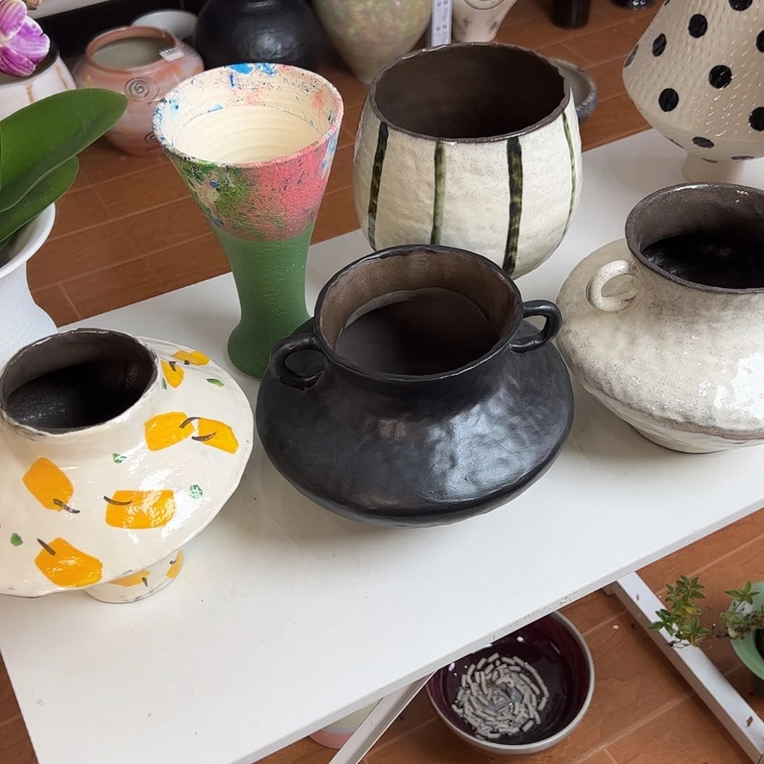 ****5个手工花盆。。。。。