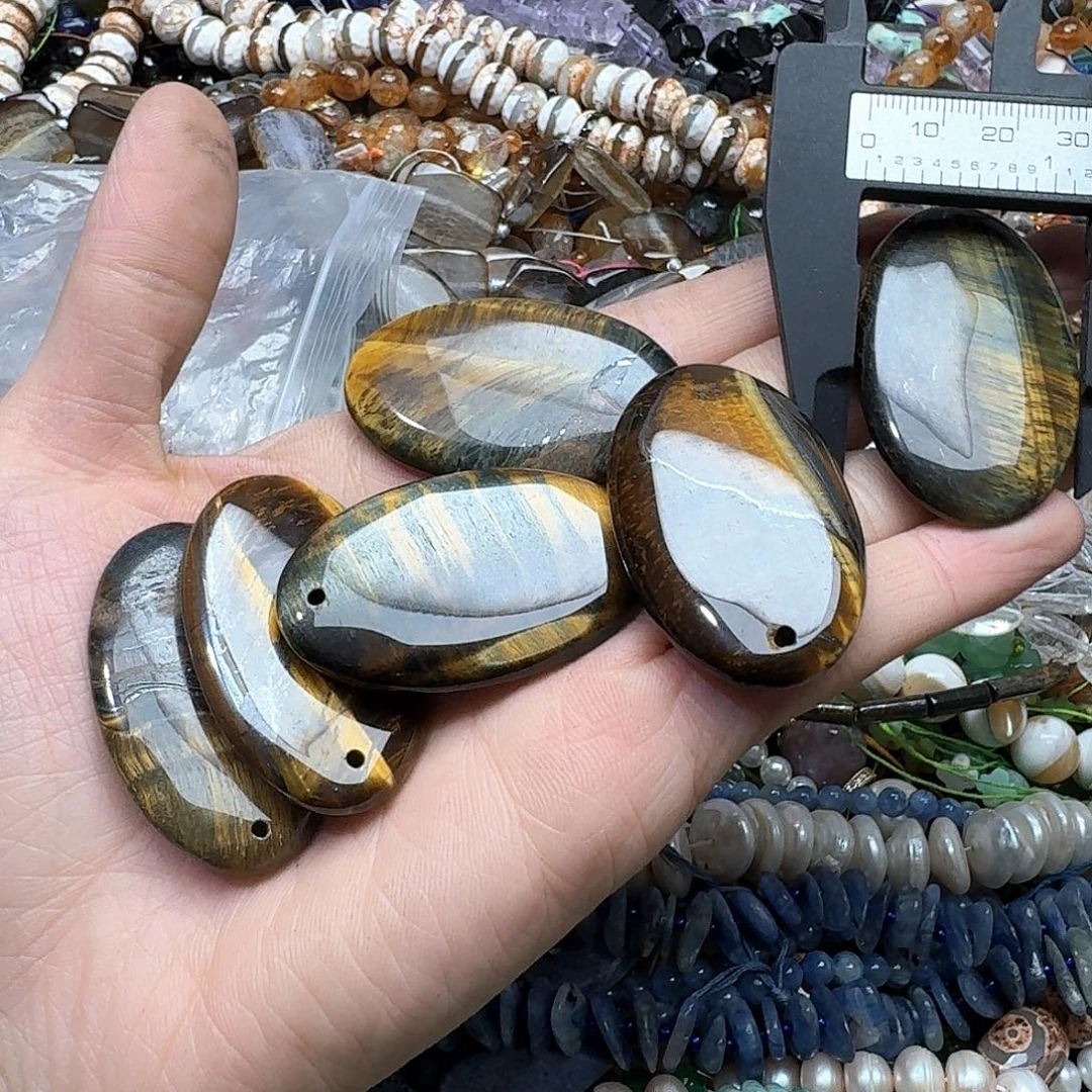 玛瑙/玉髓未镶嵌珠宝半成品一个30x50m虎眼吊坠