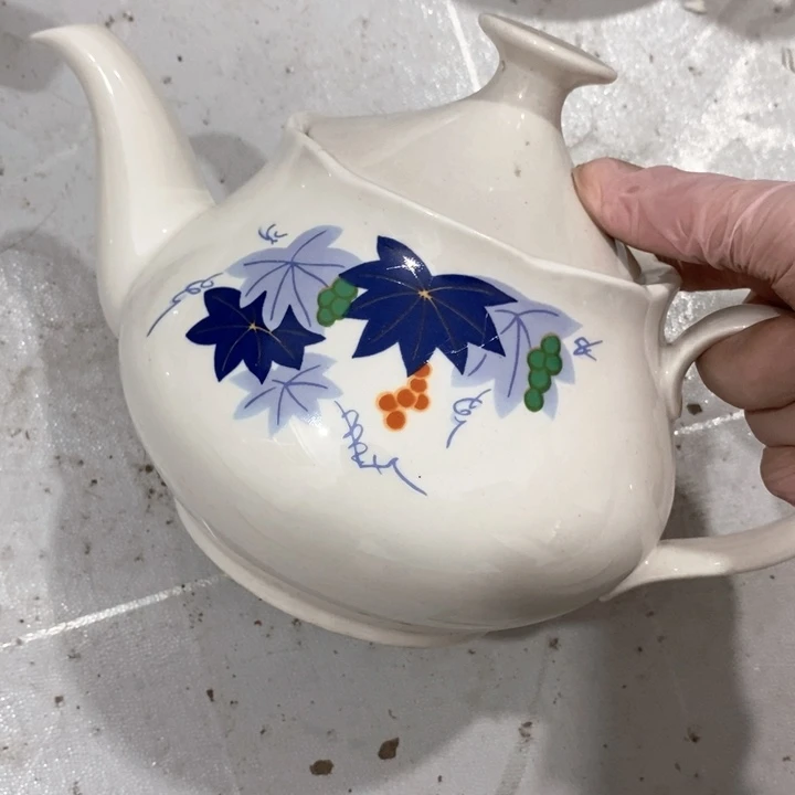 瓷片白玫牌多孔壶微瑕疵