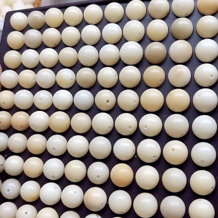 白玉菩提吊坠瑕疵14奶黄圆珠100颗