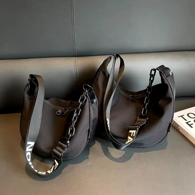 141简约休闲饺子包运动百搭斜挎包大容量通勤单肩布包#黑色