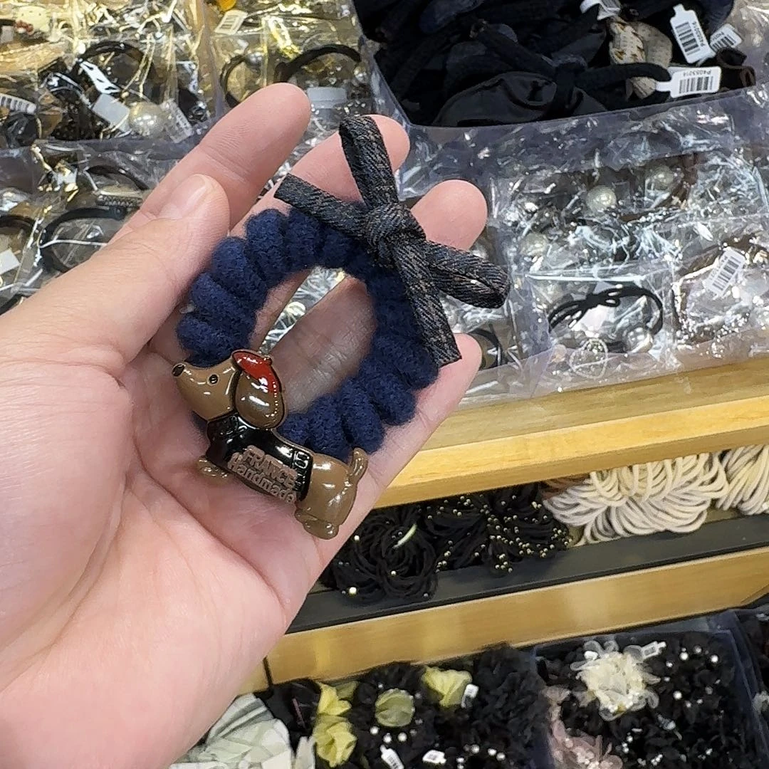 非金属蓝色电话线小狗