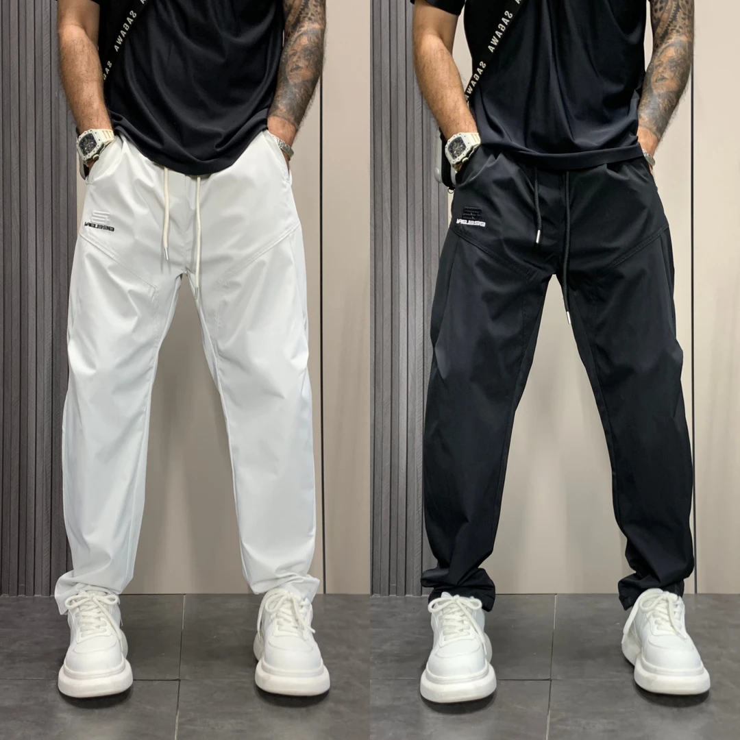 2025年秋季新款时尚设计感百搭休闲裤男士潮牌痞帅拼接宽松哈伦裤