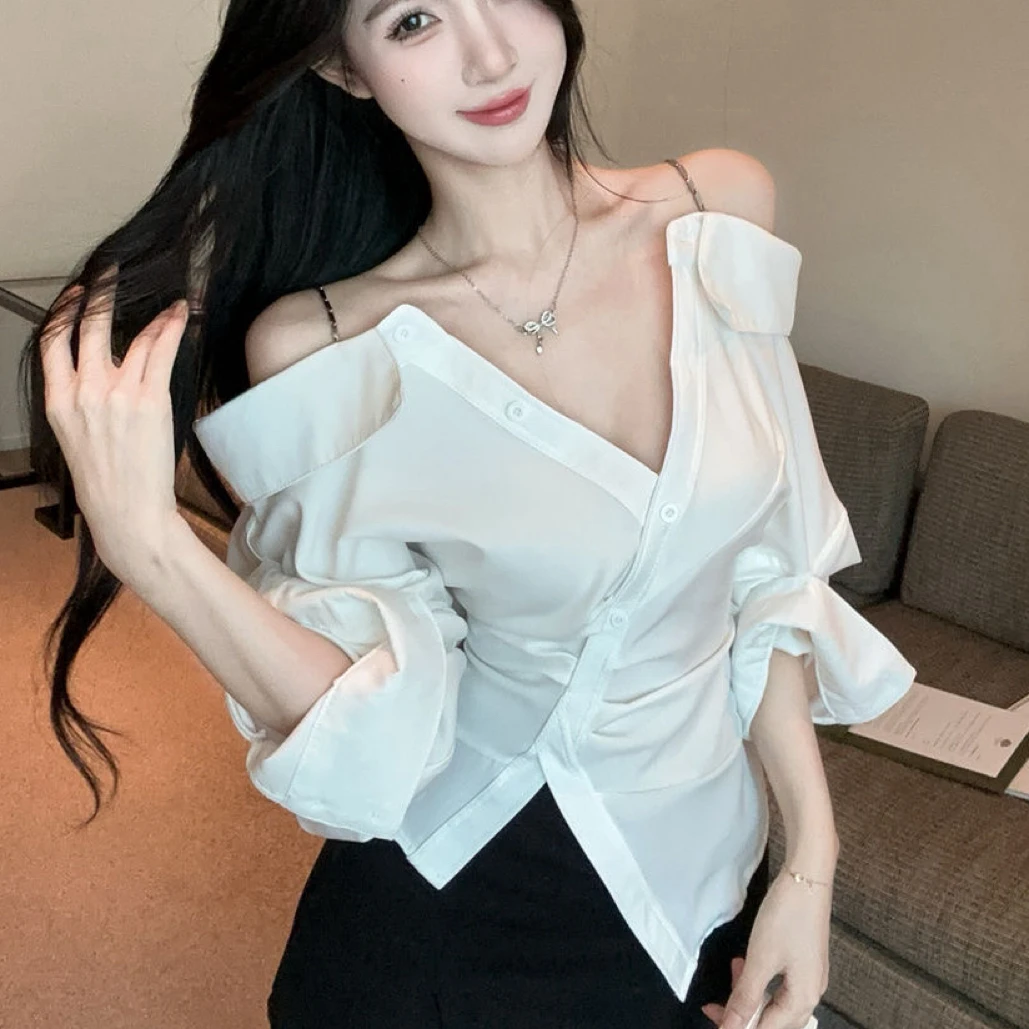 法式纯欲风一字肩甜美露肩设计感时髦性感百搭显瘦不规则长袖上衣
