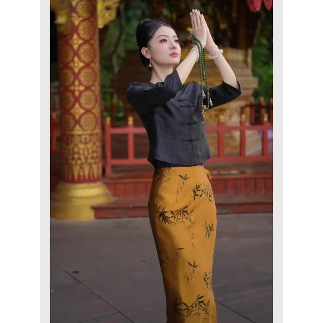 新中式国风女装2025新款巨好看气质高级感黑色上衣印花半身裙套装