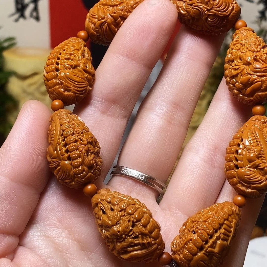 橄榄核吊坠风雨交加姐姐江河湖海