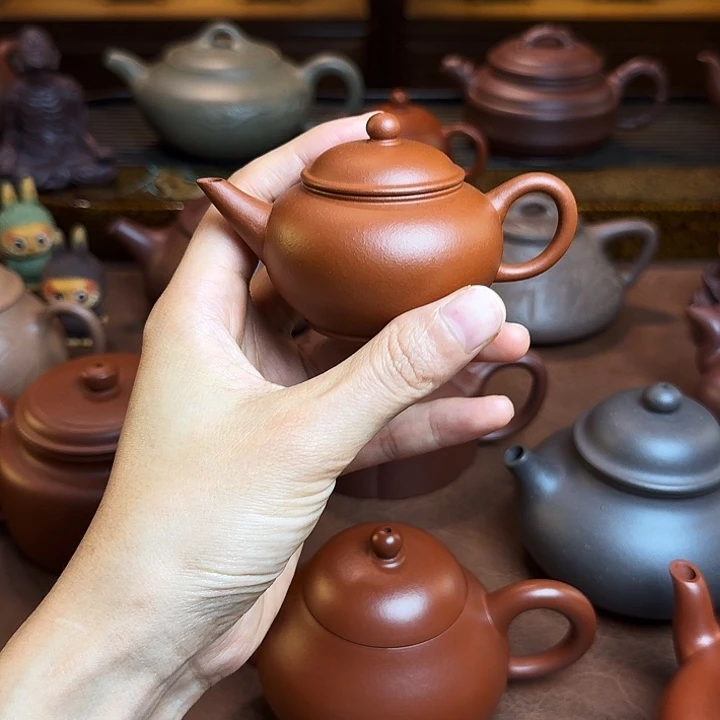 章***彦茶壶紫砂梨型壶，朱泥