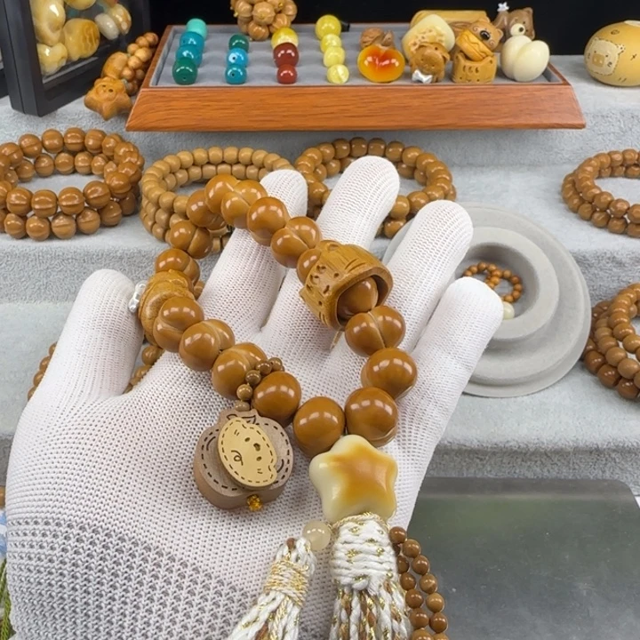 屁桃设计款猴头核桃手持