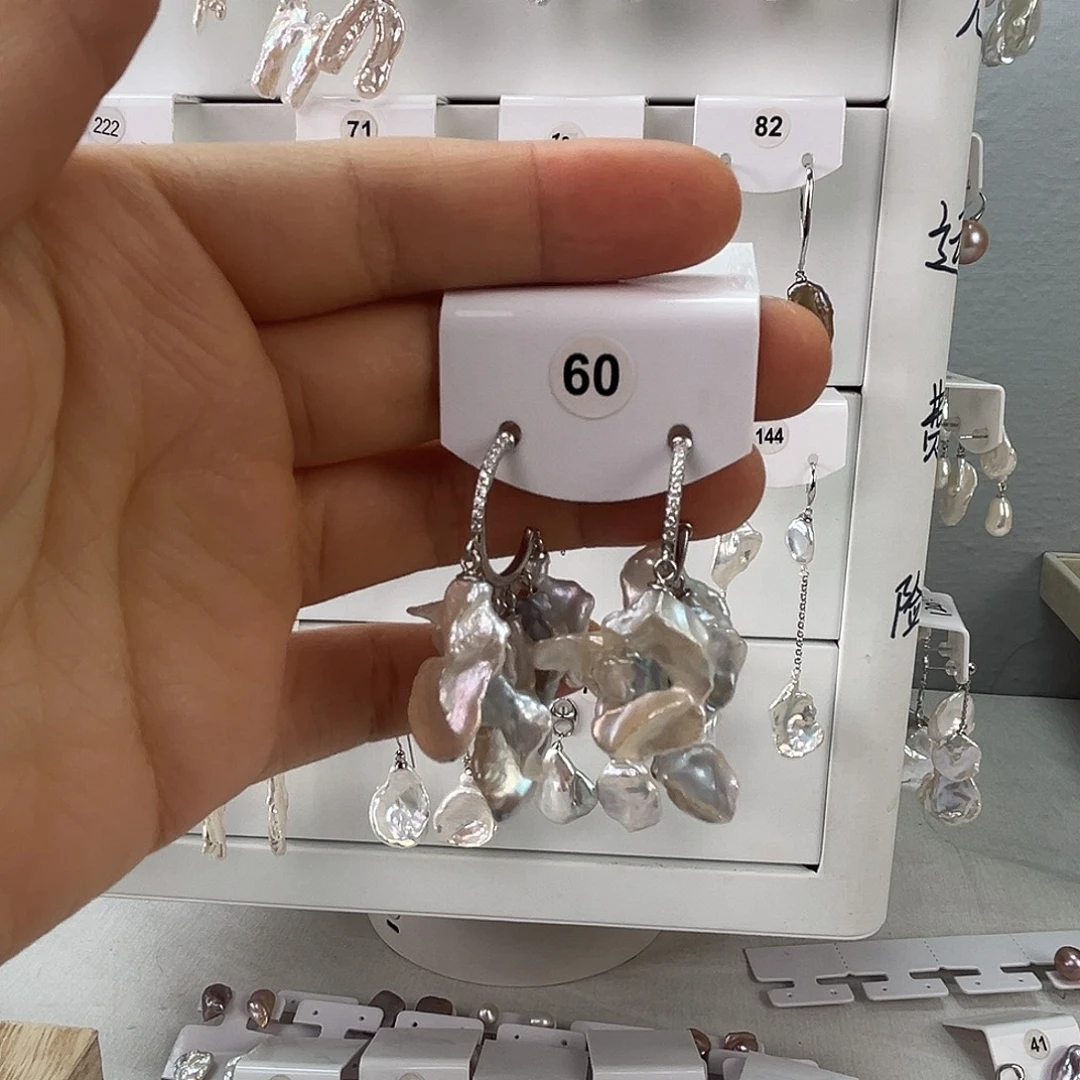 Z****非金属925银淡水60