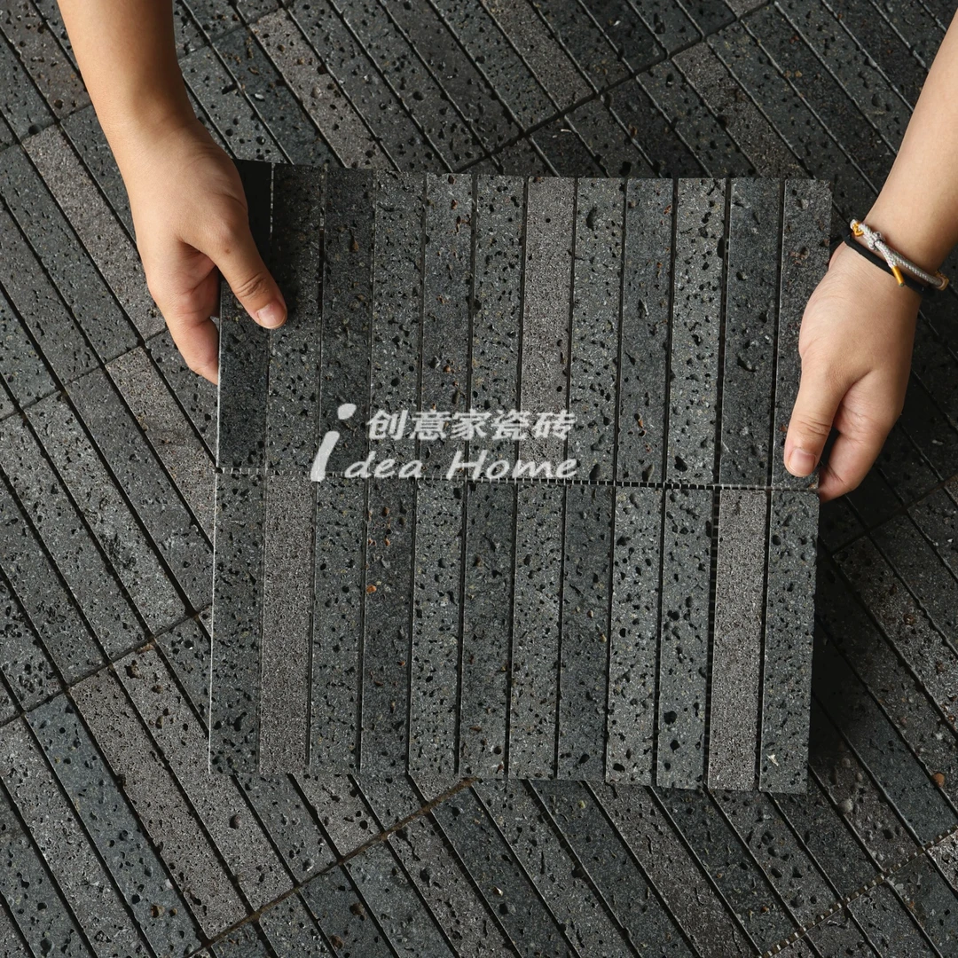 黑色火山岩洞石马赛克民宿咖啡餐厅商铺门头工装天然石材背景墙砖