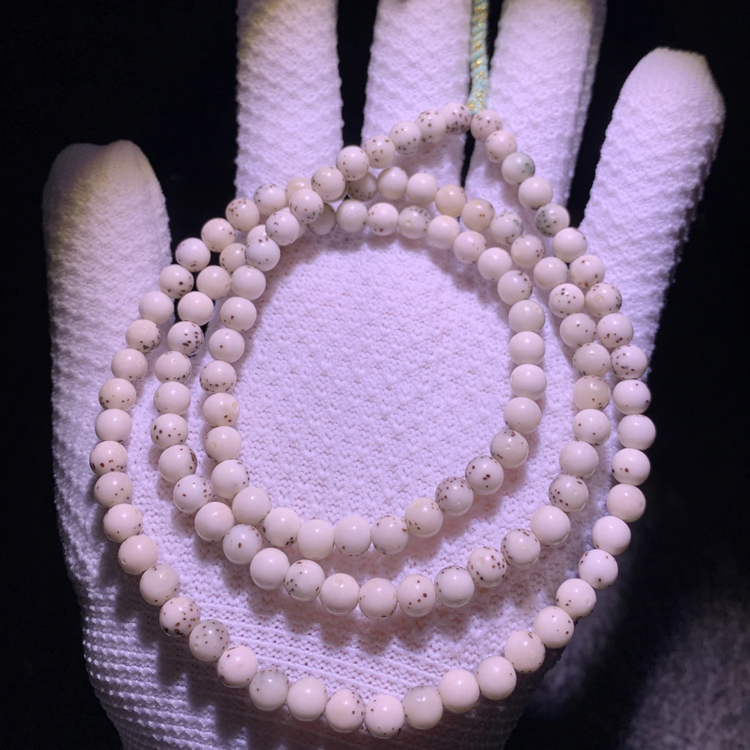 海南-星月菩提圆珠108长串 通体三分之二留白 同树同枝稀散星点