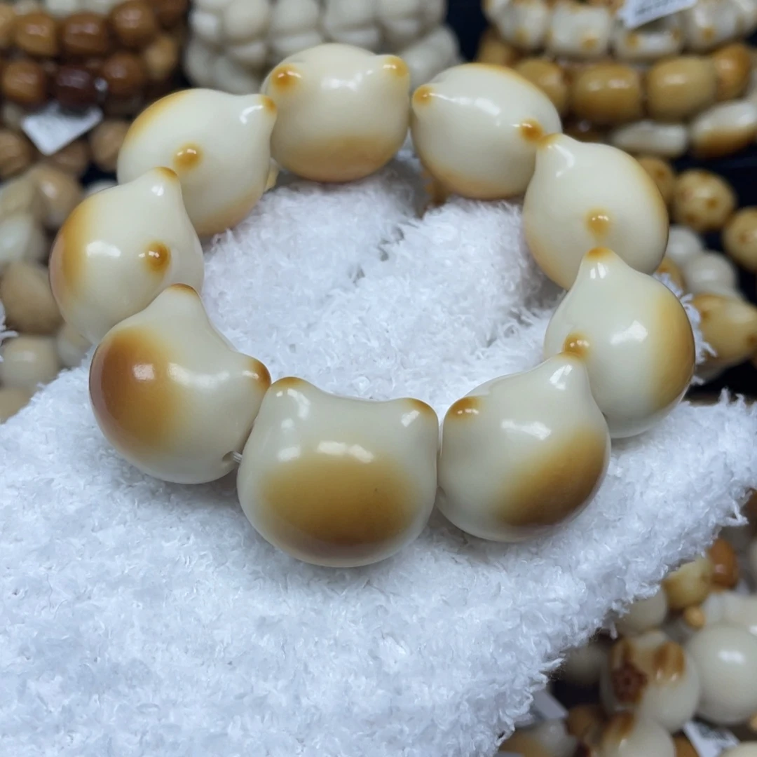 菩提根/象牙果手串12.26.65瑕猫头卡27