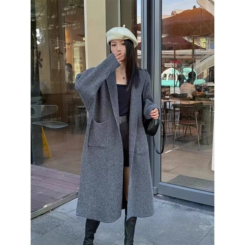 韩版时尚感长款连帽针织女装秋冬新款加厚慵懒风大毛衣外套女