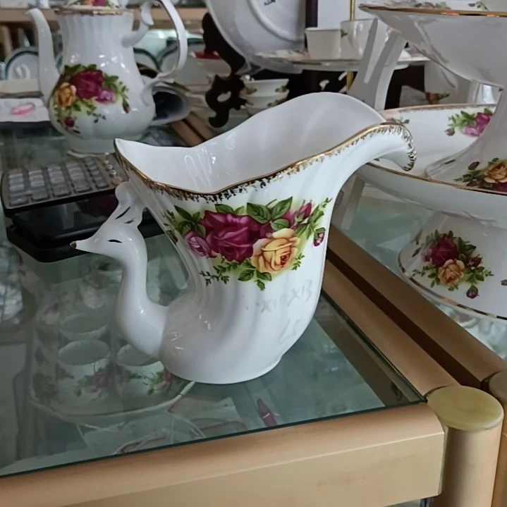 骨质瓷手工拍金凤凰置物篮