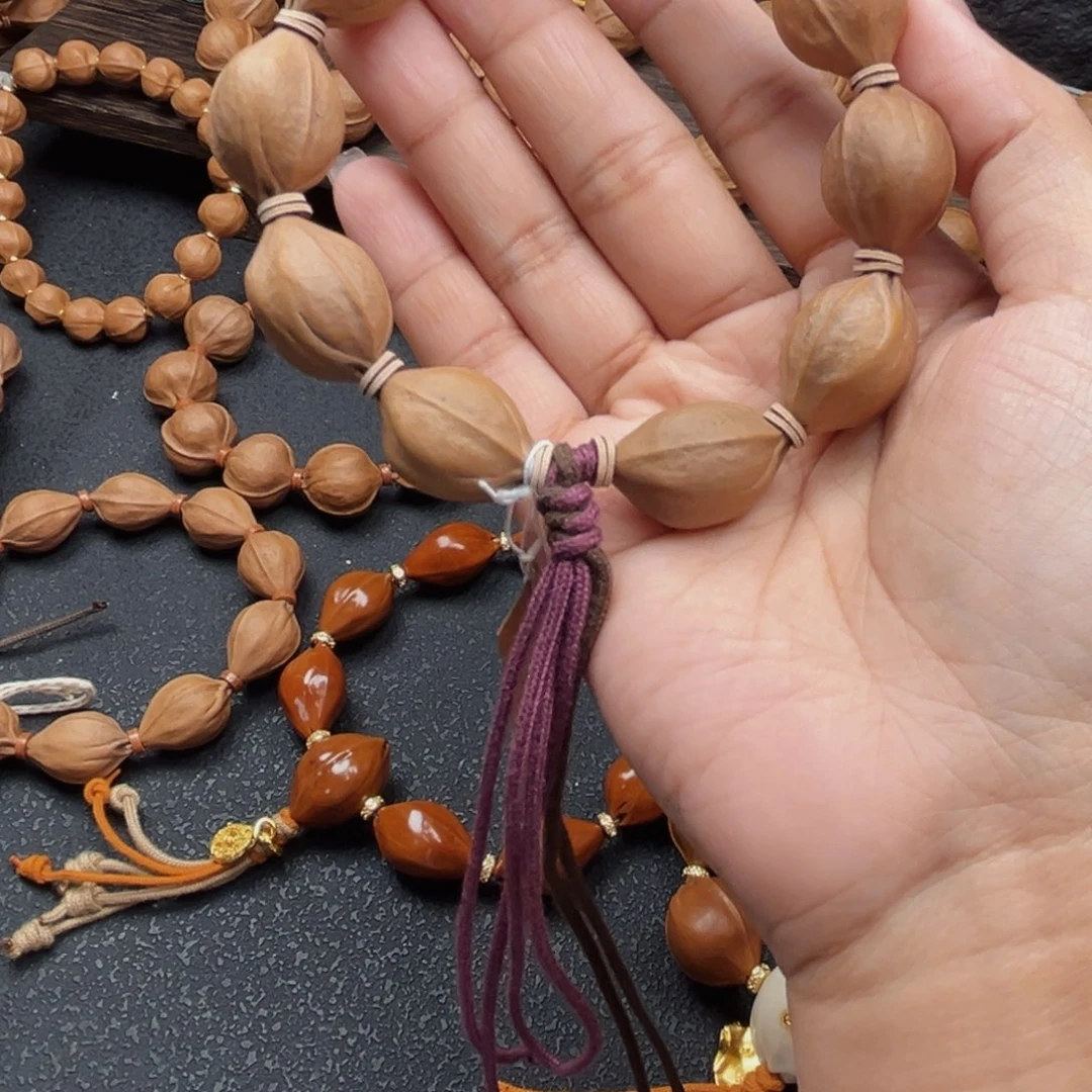 …***号手串橄榄核17.24梅林铁核