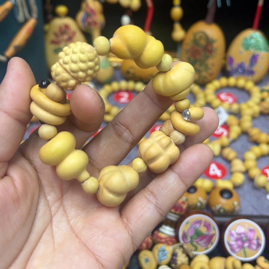 d***菜草里金多宝手串16颗葫芦
