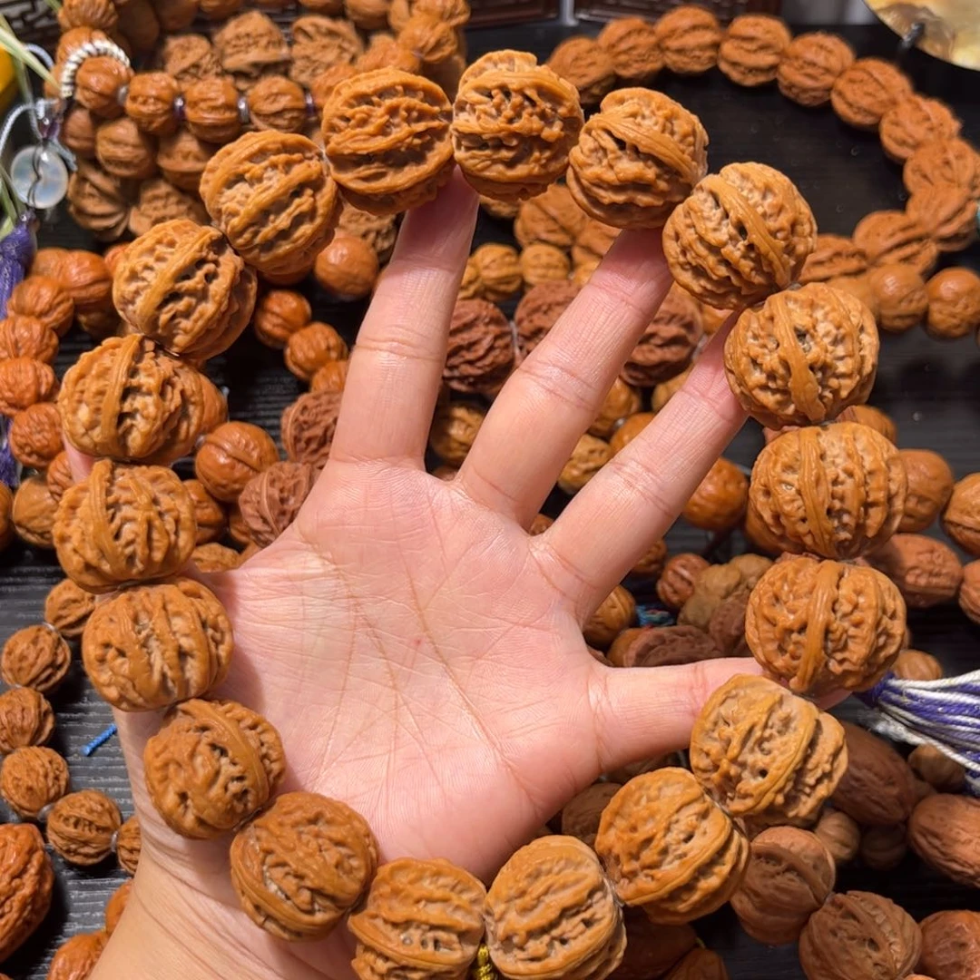 吊坠桃核野生莲花尊手持