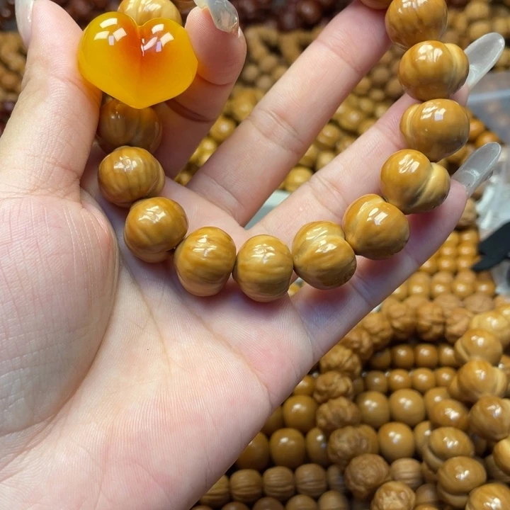 呼***狗猴头核桃手串微瑕肌理屁桃手持