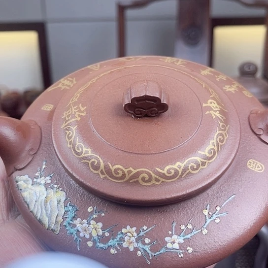 紫砂茶壶是的……是个