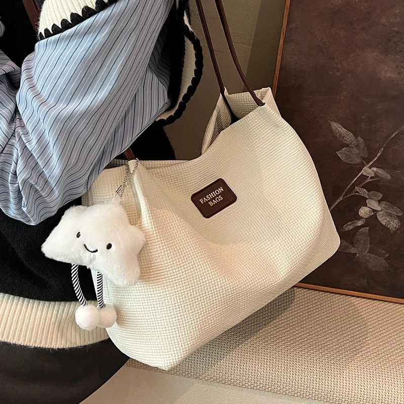 大容量包包女式2025新款秋季百搭简约单肩包时尚感通勤托特水桶包