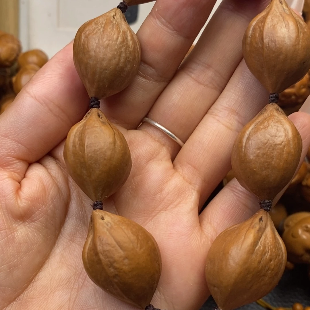 橄榄核手串三花素核