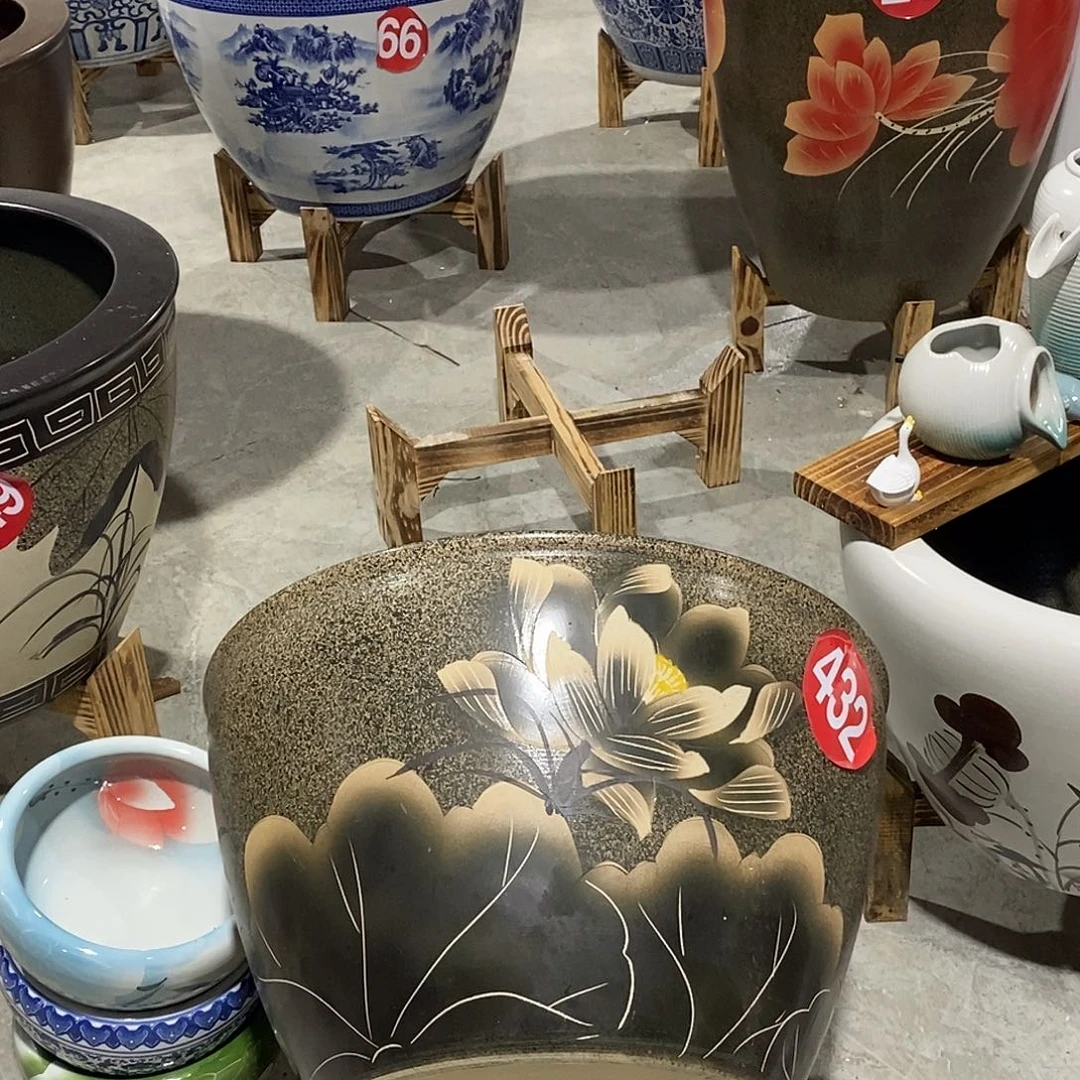 辉***歌景德镇陶瓷鱼缸艺术