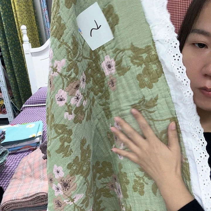 棉棉绿花花边枕巾