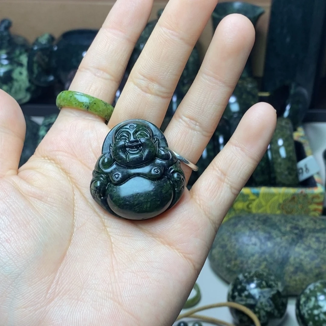 沉***雨未镶嵌蛇纹石玉吊坠