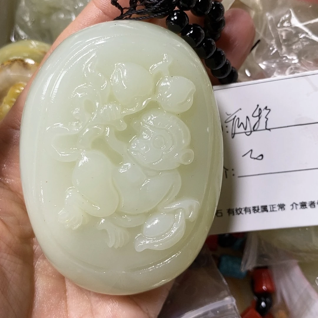 石材金**?古青石手把件