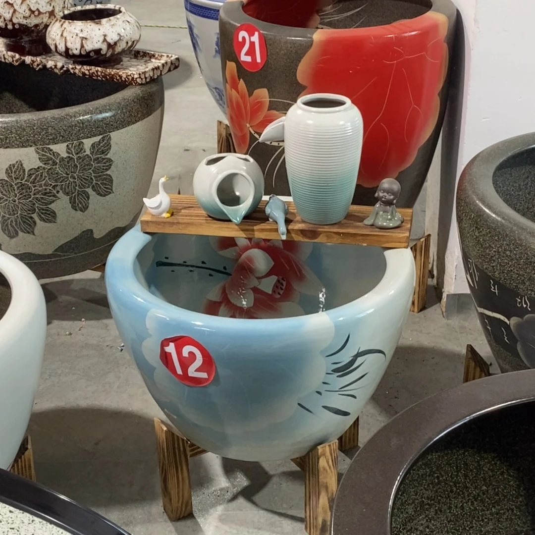 彤***贝瓷摆件景德镇陶瓷鱼缸艺术