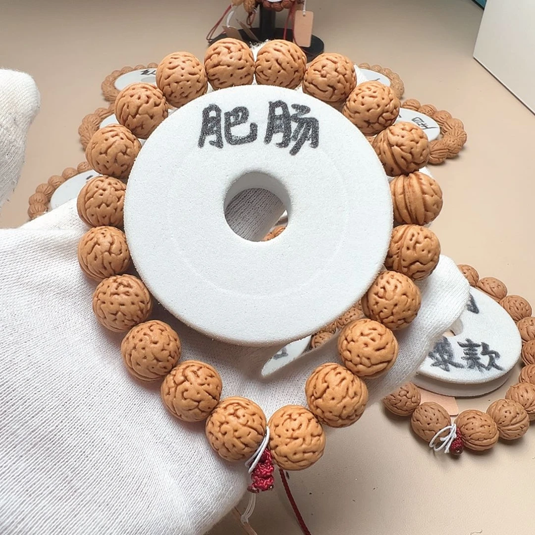 九***日桃核手串1.3肥肠肥脐