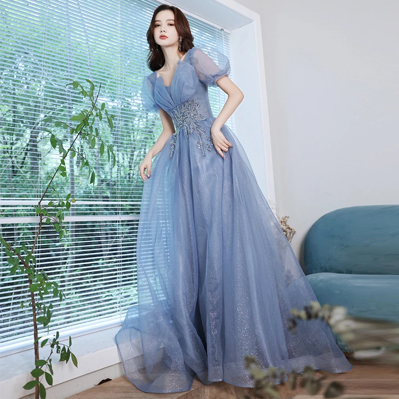 蓝色晚礼服裙女2025新款春季仙气质法式长款年会主持人修身连衣裙
