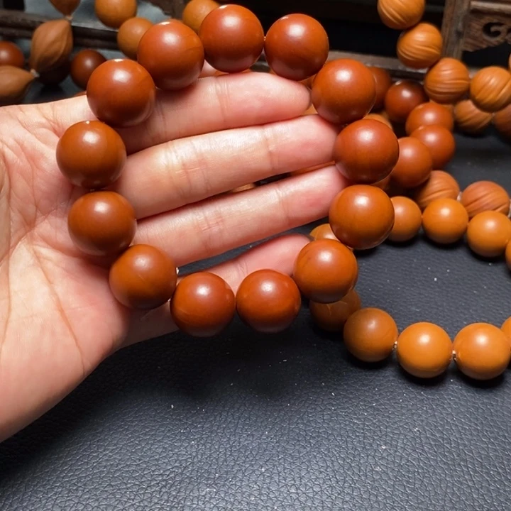 手串橄榄核1.7尺寸树王鸡血红光珠全品