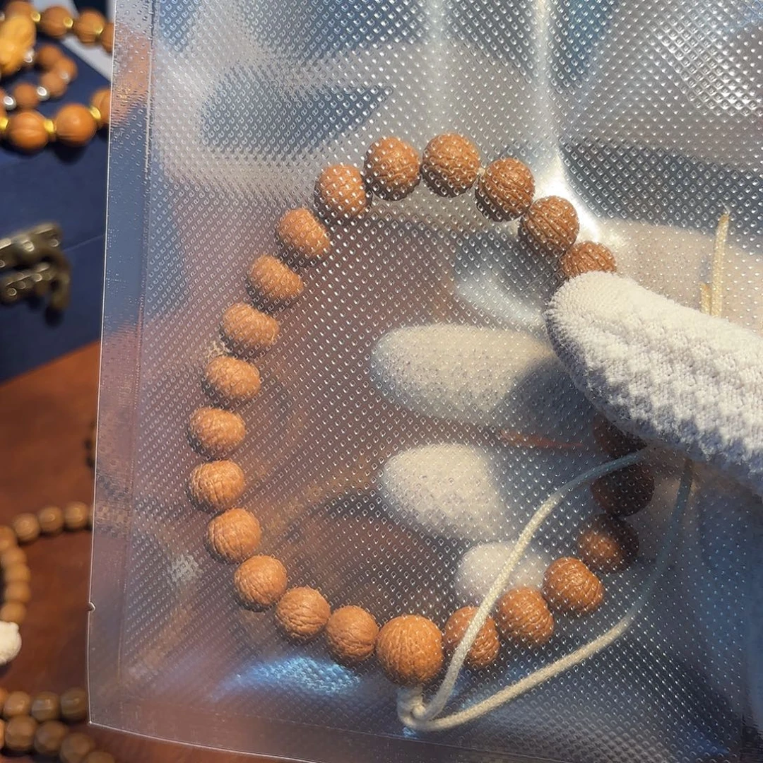 J***.吊坠猴头核桃凤羽12