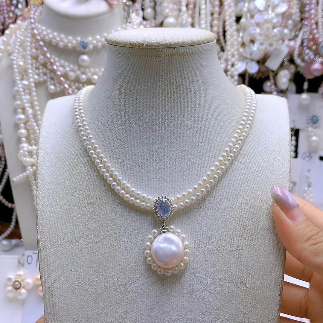 银S925镶嵌耳饰淡水珍珠L***y