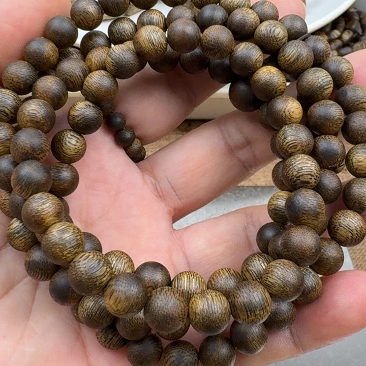 吃***的手串沉香张勺子手串26克