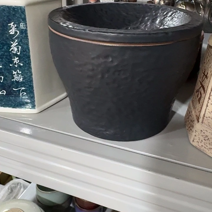 主人杯一个，爱。。品茗