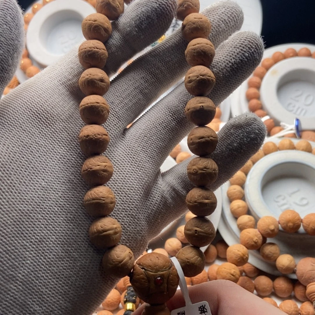 P***X吊坠凤眼菩提实心奶油皮