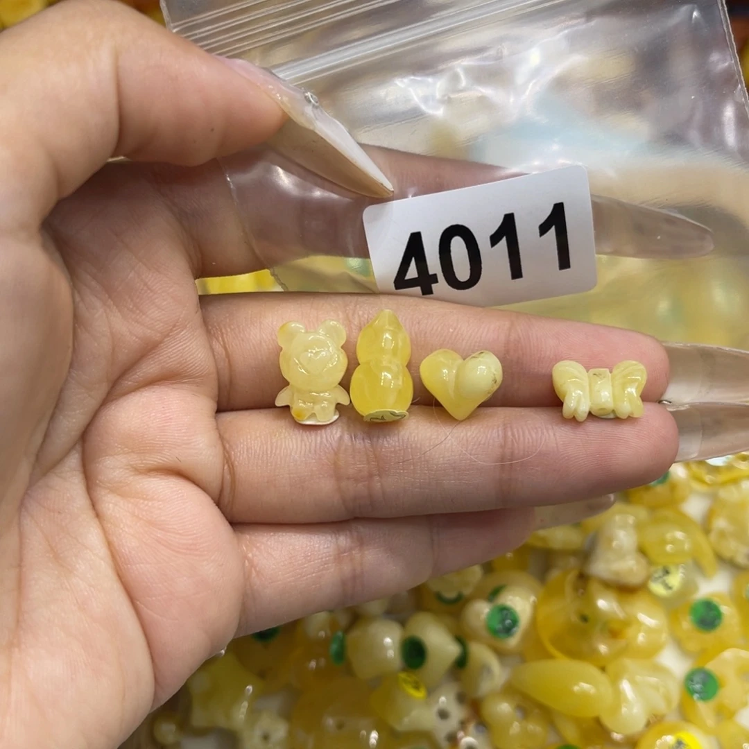 桔***呀琥珀未镶嵌珠宝奇石