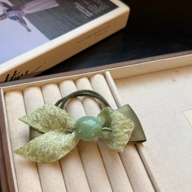 7794绿色不对称蝴蝶结皮筋