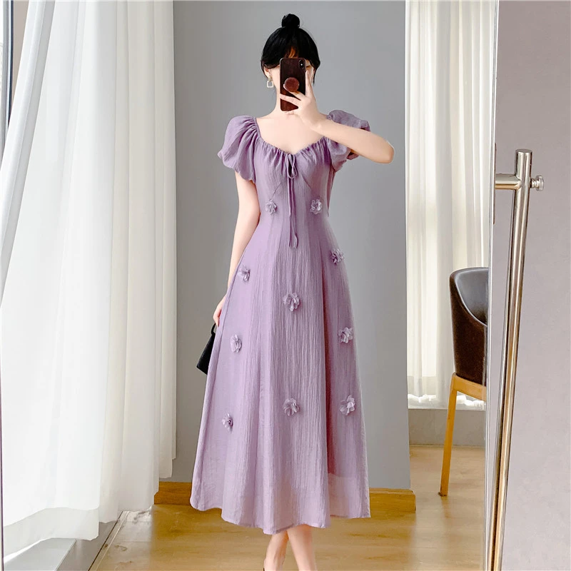 紫色立体花朵V领连衣裙女夏季2025新款高级感海边度假风减龄长裙